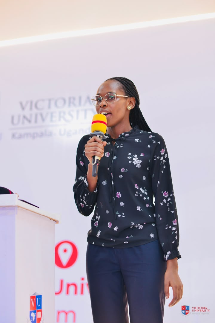 Student presenter speaking to classmates at the Victoria University July intake orientation
