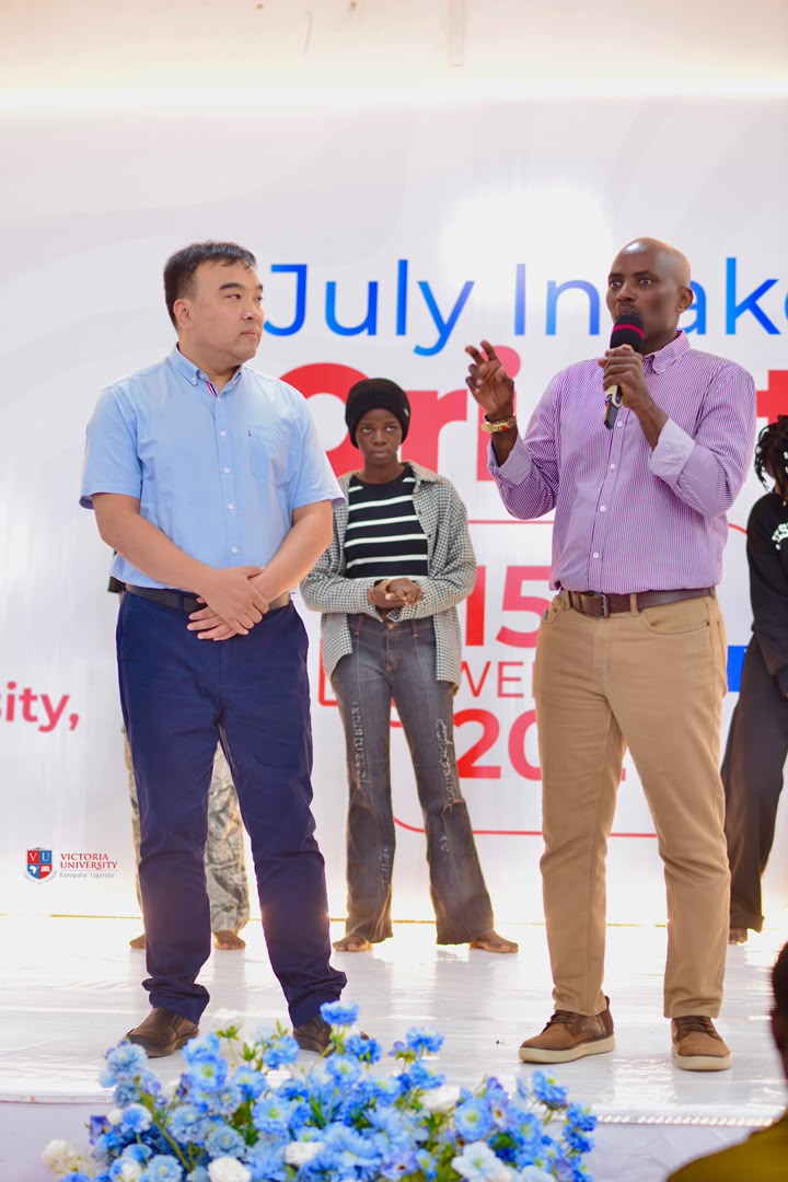 Victoria University staff and international guests seated on stage at the intake orientation